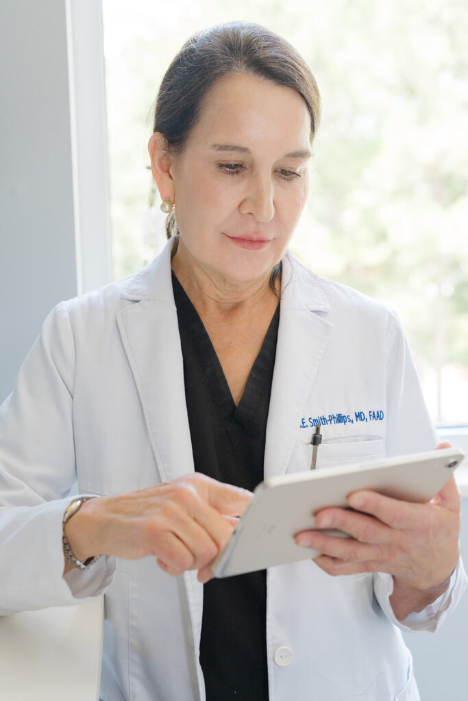 doctor looking at iPad for Charleston brand and headshot photos by Krissy Millar
